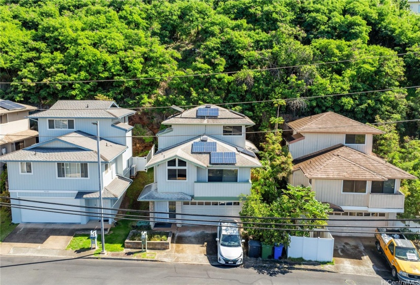 Nestled in the mountains, facing sunset Pearl Harbor views.