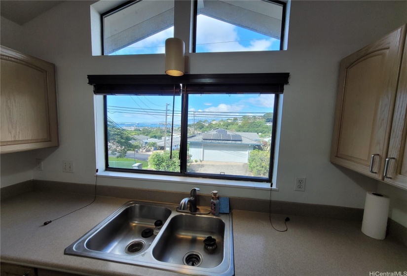 Look out to Pearl Harbor as you wash the dishes
