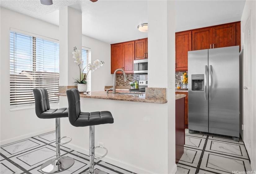 Open floor plan offers eat-on granite counter for easy dinning options!