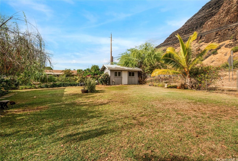 This property offers 10,415 square feet of space, perfect for relaxation and outdoor activities. Enjoy the tranquility of your backyard with mountain views, complete with a convenient storage shed for all your needs