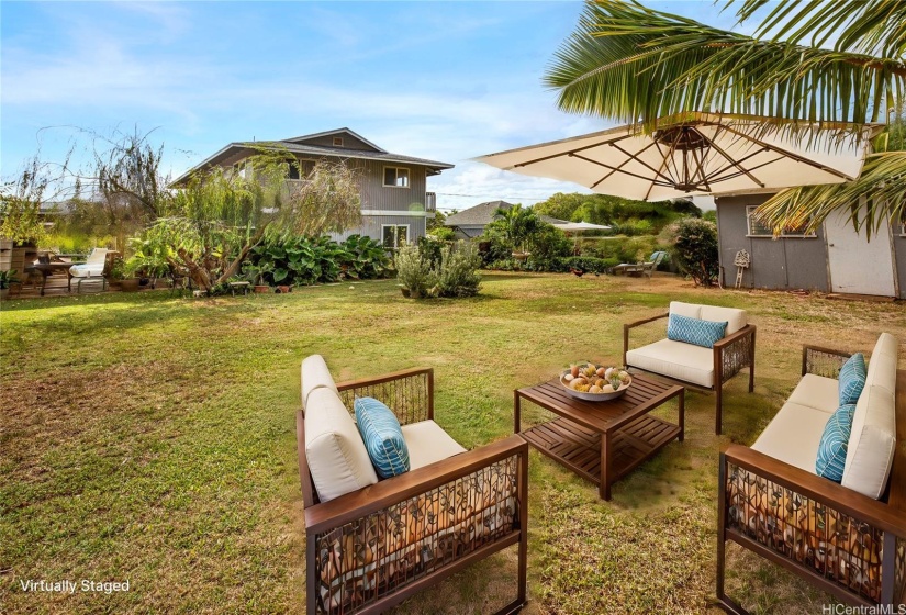 VIRTUALLY STAGED. This property boasts a spacious backyard, perfect for entertaining or relaxing. The covered patio behind the carport provides a comfortable outdoor space to enjoy gatherings or unwind in the shade.