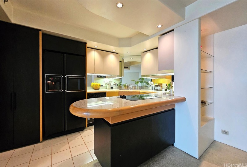 Flows seamlessly into a large open-concept living and dining area