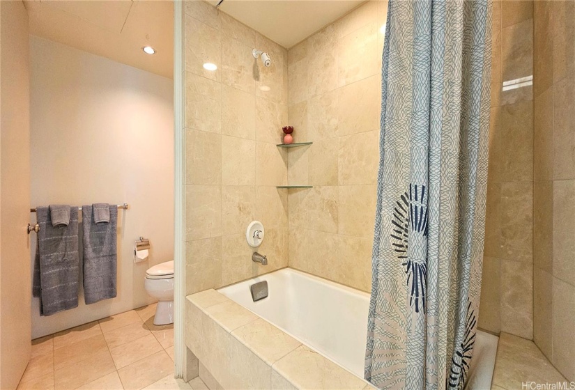 Primary bedroom ensuite bathroom with soaking tub