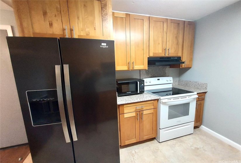 Large fridge, microwave, stove/oven provided