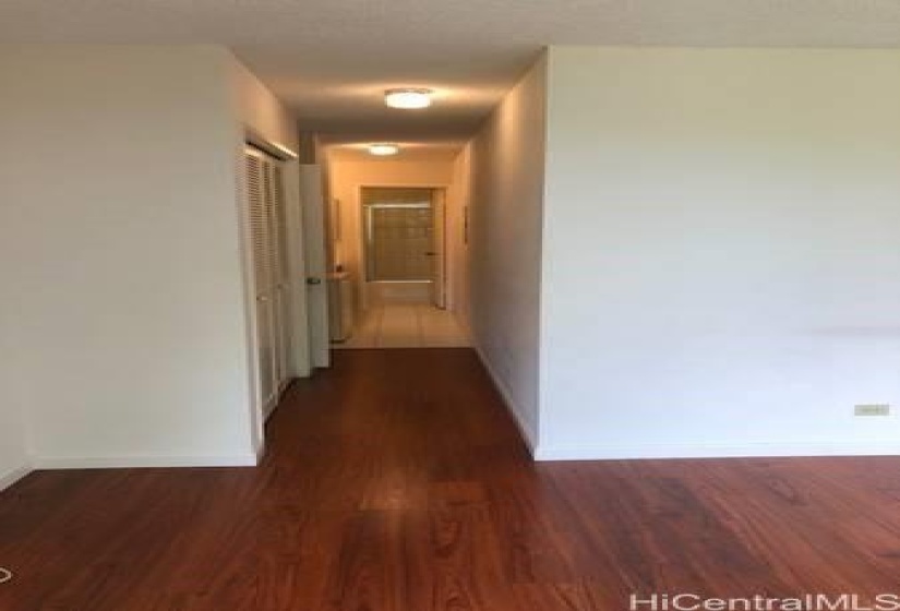 Bedroom to the hallway leading to the bathroom