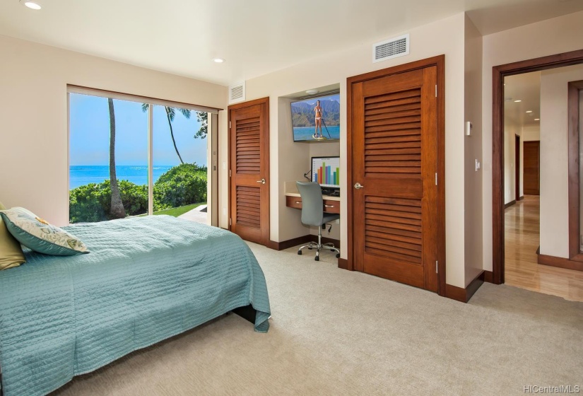 Enjoy the first floor master suite and walk out to the beach from your own lanai patio. Beautiful, louvered doors enhance the modern feel of clean and simple lines yet adding an element of tropical living.