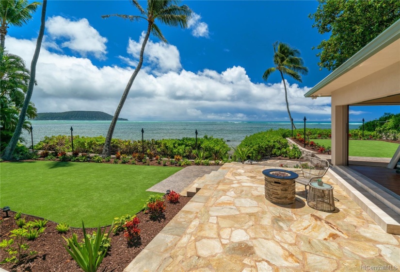 Easy yard maintenance with automated watering to all plants (mostly drip), and a synthetic lawn for reduced water usage and a nice, clean look.