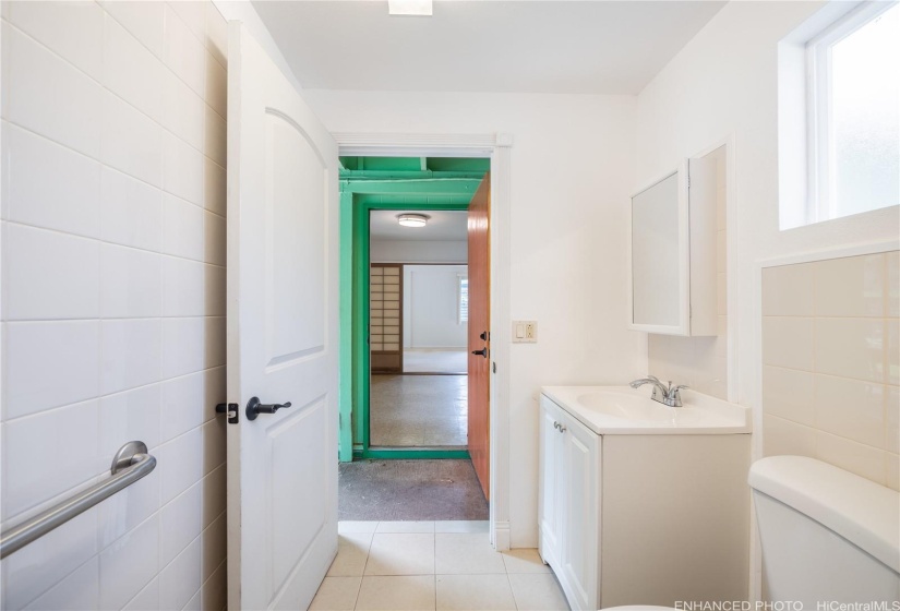 Utility bathroom in carport enhanced