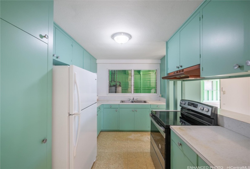 Original kitchen with newer appliances enhanced