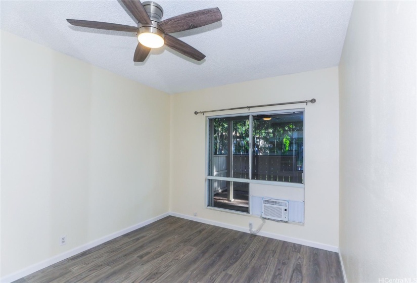 Primary Bedroom with ceiling fan/light and A/C