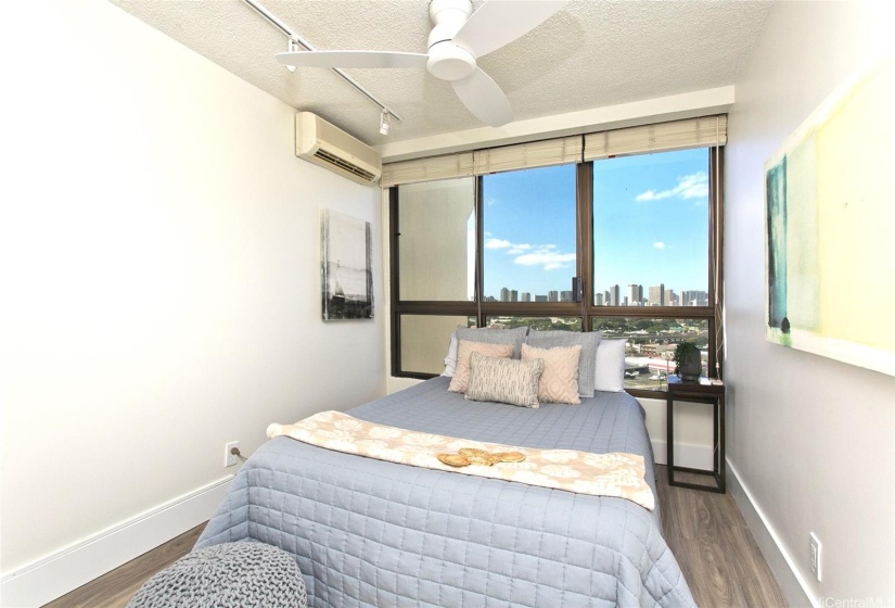 Both bedrooms and living room with split AC. Guest bedroom with lots of light.