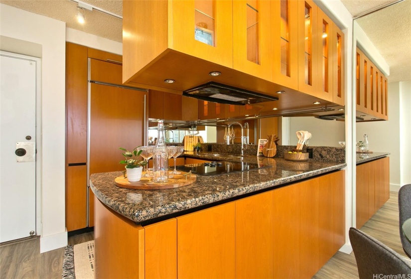Lots of stoarge with kitchen design inc lighted uppers with lights!
