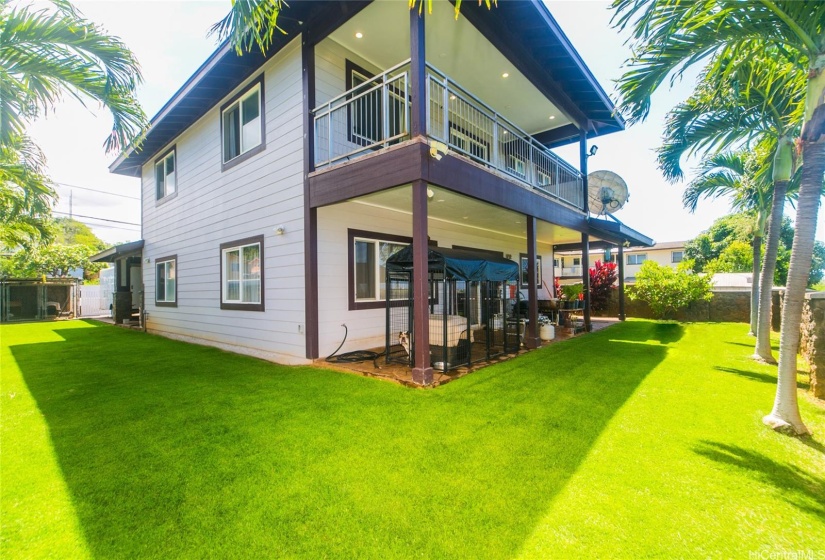 Rear of Home with Patio both upstairs and downstairs