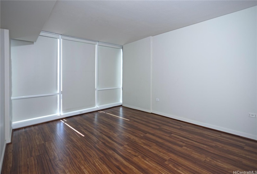 Primary bedroom with motorized blinds