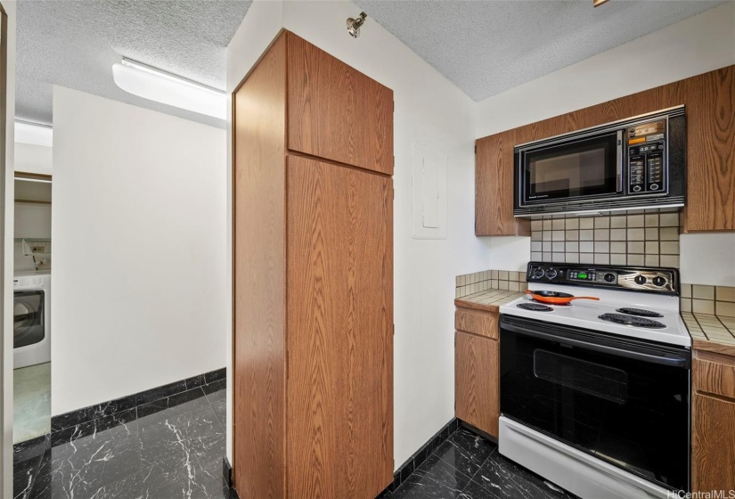 Kitchen is on the left upon entering
