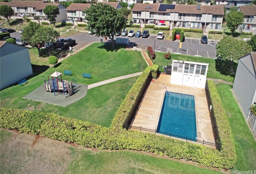 Enjoy this pool & playground just a short walk from your home.