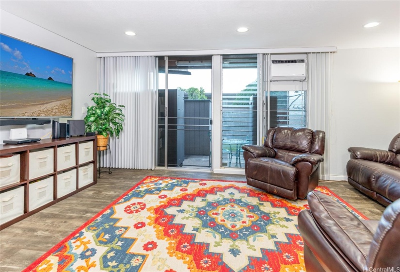 Living room area with sliding door for back yard