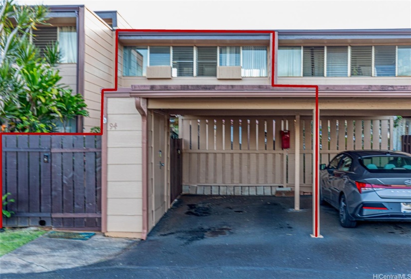 Front entrance with 1 car carport