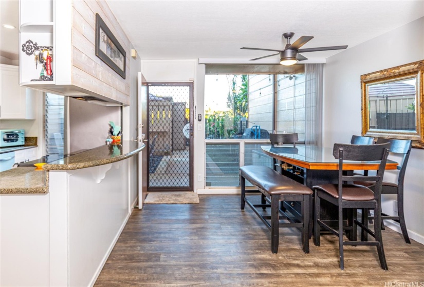 Kitchen/dining room with front entrance door