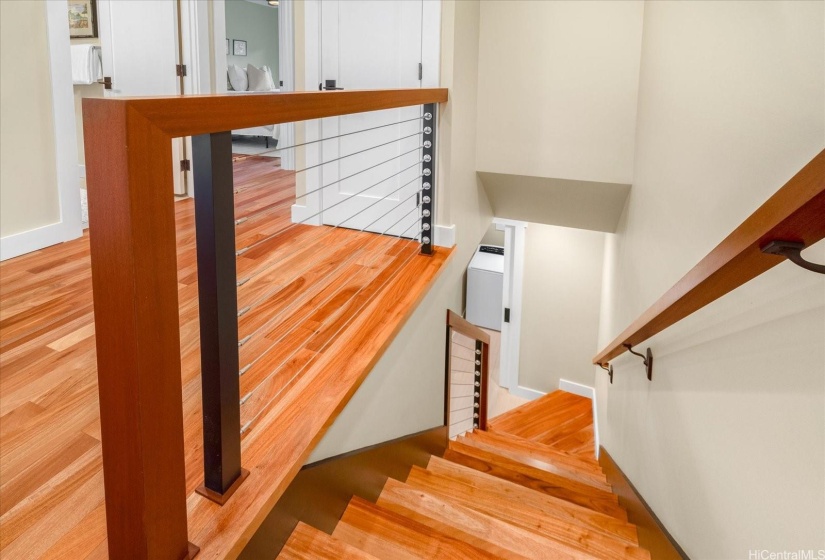 ALL railing hardwood was custom designed and fabricated, and beautifully finished with high-grade tension cabling and stainless steel hardware.