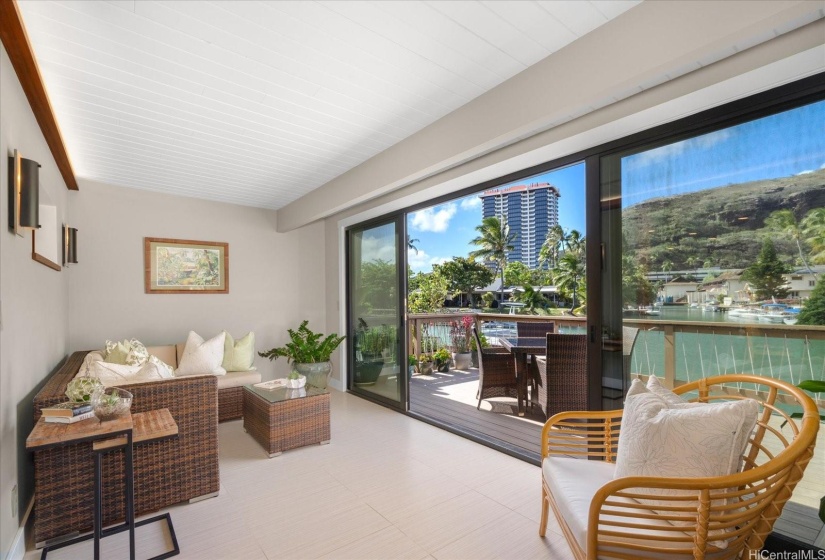 A fully enclosed lanai expands the living spaces for indoor/outdoor dining and entertainment.