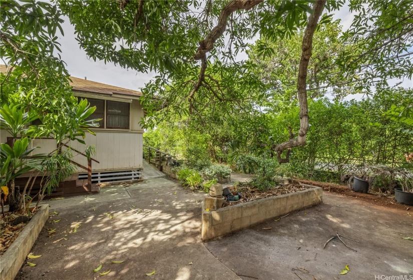 Bring your green thumb and put it to work with this wraparound yard space