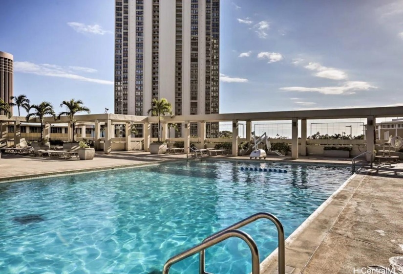 Heated, saltwater pool alongside the Fitness Center and Pool Bar