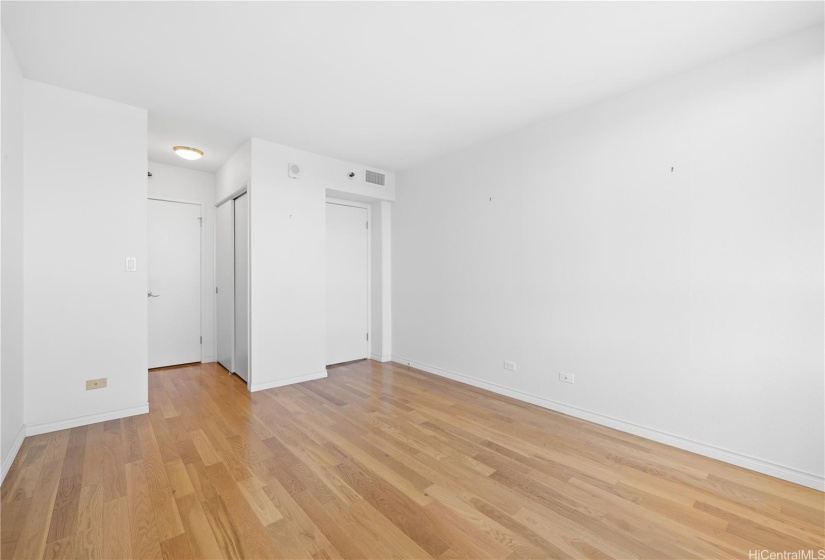 Primary bedroom with dual closets