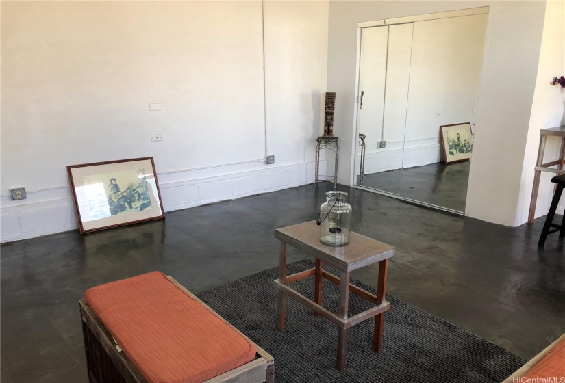 Concrete floors in the studio - mirror closet to your right.