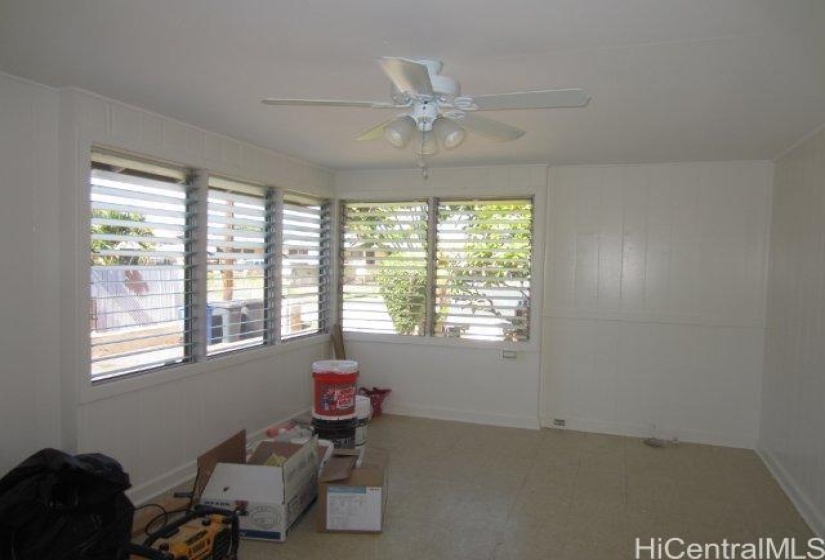 2 bedroom cottage - living room as it was being painted several years ago.