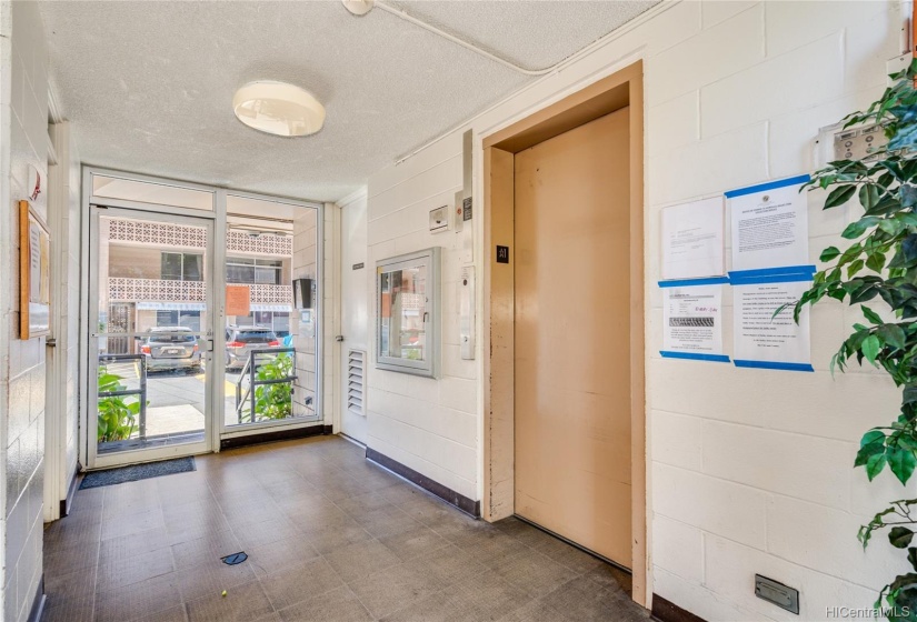 Secured building with keyed entry, intercom, and elevator