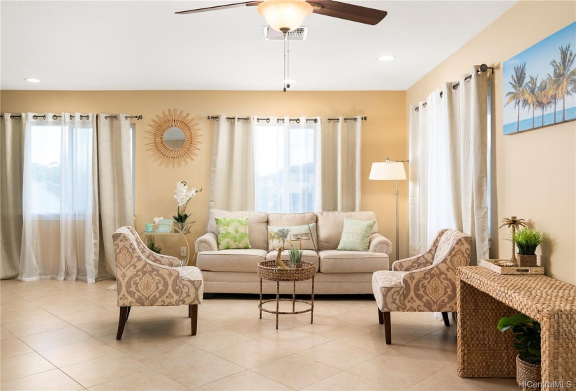 Spacious living room spaces create intimate settings to enjoy, relax and refresh... Living the Island lifestyle in Kailua is your Legacy opportunity at this home!