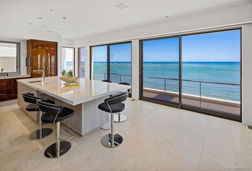 Lots of space around the kitchen island for sunset cocktails and appetizers with family and friends.