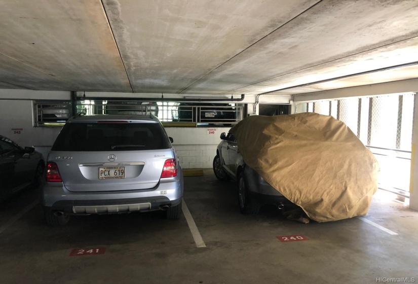 SIDE BY SIDE PARKING NEAR THE ELEVATORS.