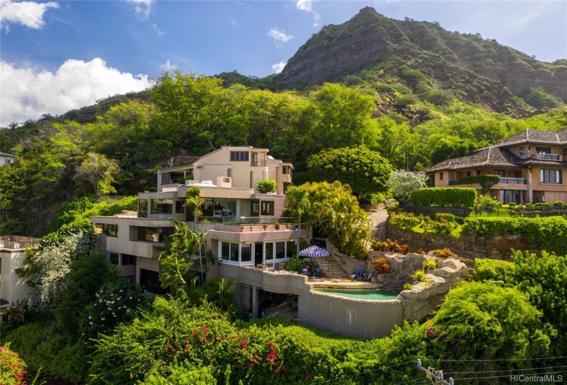 Perched on iconic Diamond Head, this estate is just minutes from the ocean but situated for privacy.