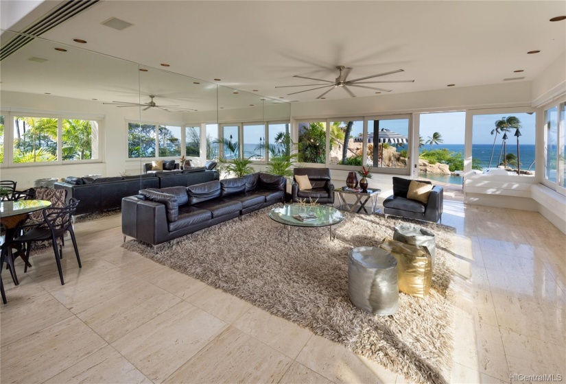 Windows slide open to allow the trades to flow through. Expansive ocean views all around. Forever views overlooking Leahi Park.