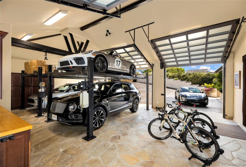 900 Sq Ft finished garage with multi car lifts