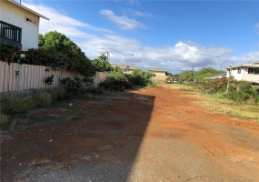 Photo taken from Ewa Beach Road facing Fort Weaver Road in the distance.  8,500 sq.ft. lot plus 5,000 sq.ft. lot in the distance.