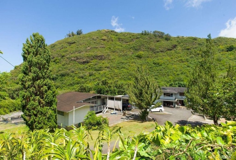 A view of the second house on the left; 2-story workshop on the right.