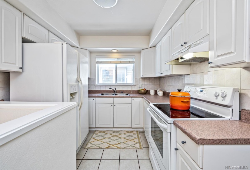 Upstairs unit boasts 3BD/2BA and a full kitchen with stacked washer/dryer.