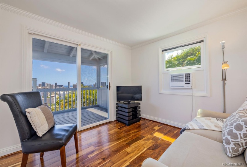 Third bedroom with great views opens out to the expansive lanai and is next to the third bathroom on the main level.