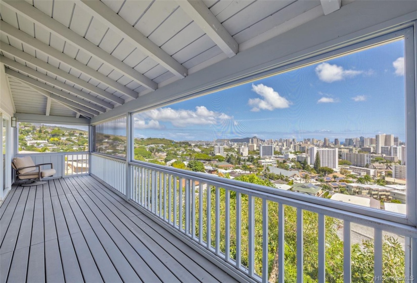 Panoramic Diamond Head and city views from the expansive covered lanai.