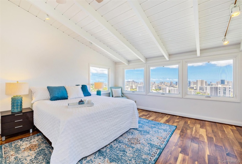 Primary bedroom with iconic view of Diamond Head.