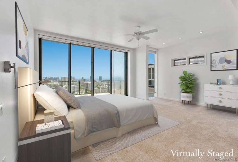 Primary Bedroom with lanai access! New carpets & high floor to ceiling sliding doors! Virtually Staged