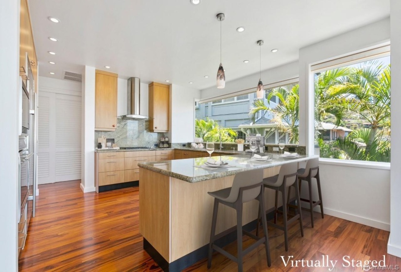 Great for entertaining! Open floor plan with Wolf and Sub-Zero appliances and views of Diamond Head while you're cooking!Virtually Staged