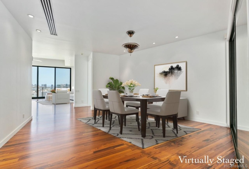 Spacious dining area with high ceilings.Virtually Staged