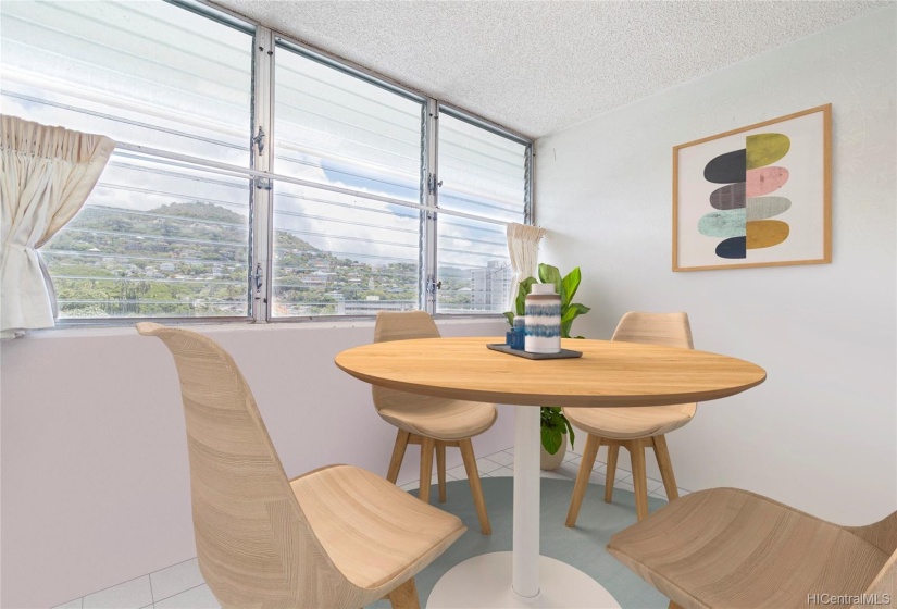 Casual Dining Area/Breakfast nook in the Kitchen area.  **THIS PHOTO HAS BEEN VIRTUALLY DECLUTTERED & VIRTUALLY STAGED**