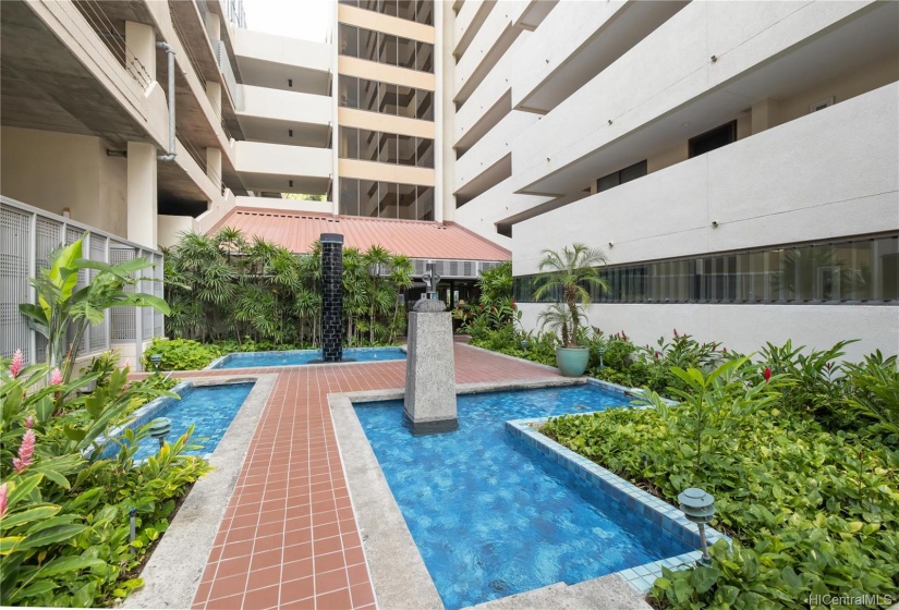 Zen, relaxing entrance to the building with water features and sounds of nature