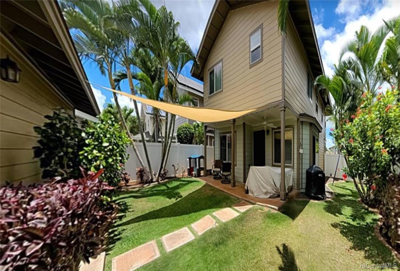 Landscaped Backyard with Covered Lanai